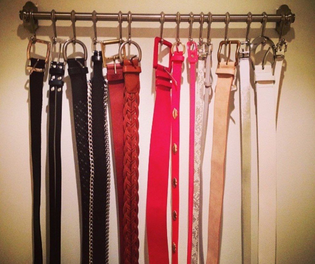 Neatly hang your belts and scarves on towel hangers