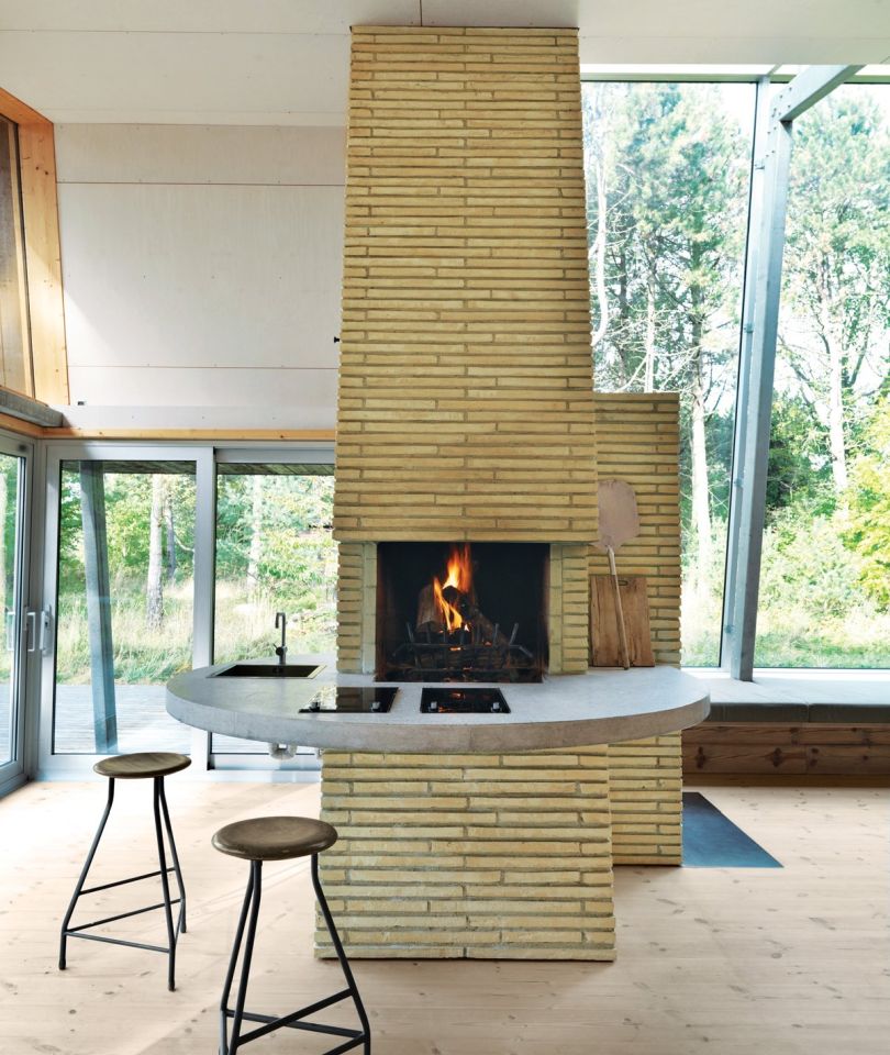 Open plan home with a towering chimney