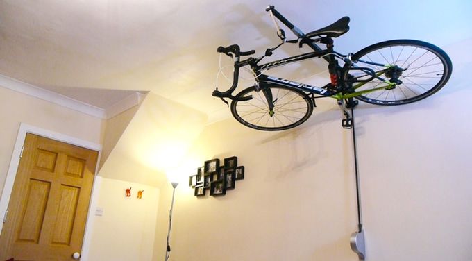 Ceiling is a great place to store your bike