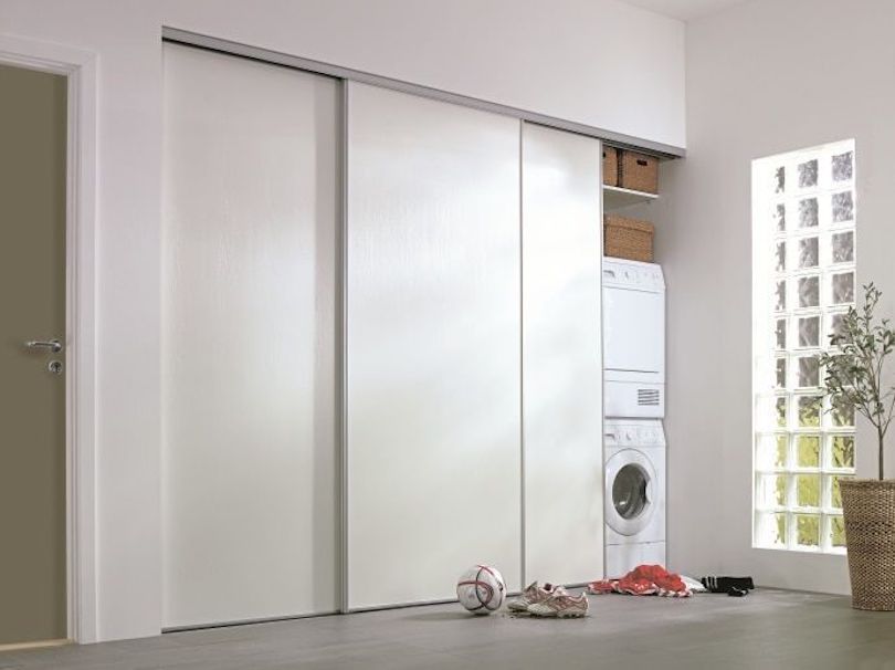 Create utility room behind sliding doors