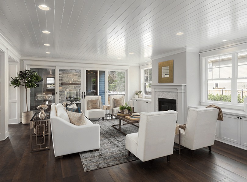 Paint your ceiling white or add a white high-gloss ceiling