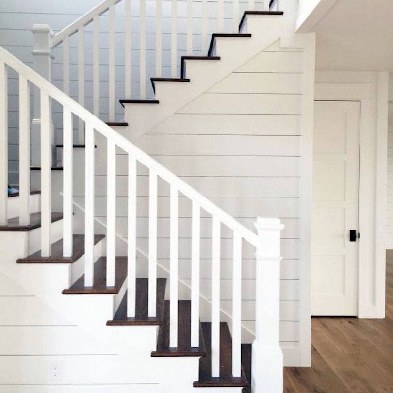 Elegant Staircase with White Steel Railing