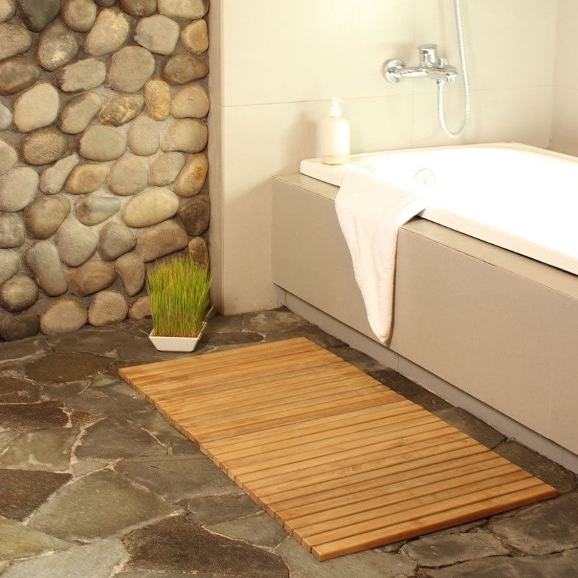 Add a Cedar or Teak Bath Mat