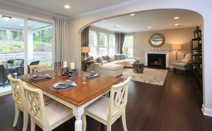 A living room extending to a dining room