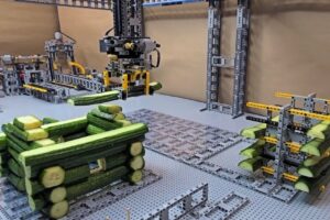 Lego Mega Factory Uses Cucumbers To Build Tiny Log Cabins
