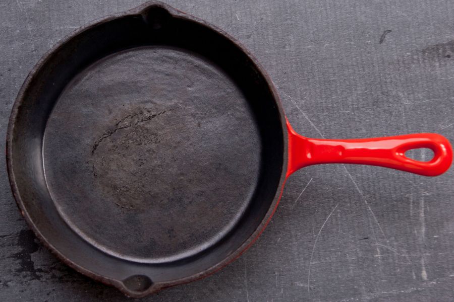 how to clean a cast iron skillet with burnt on food