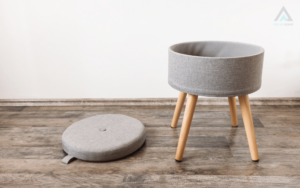 Grey Pouffe to store clothes